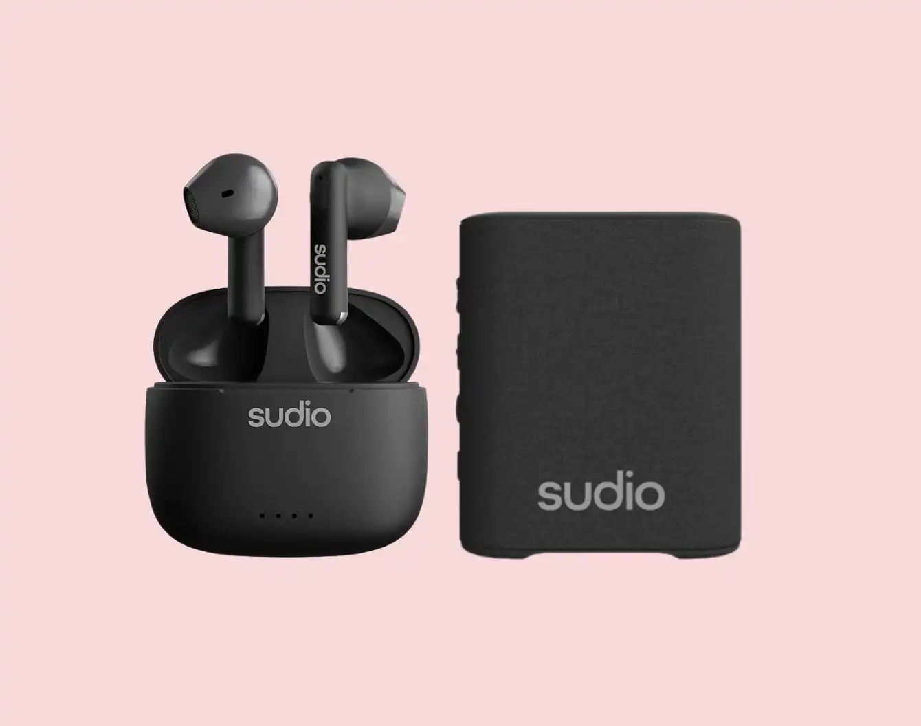 Black Sudio headphones and speaker on a pink background.